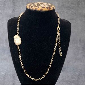 Chunky gold plated necklace with a large faux pearl pendant